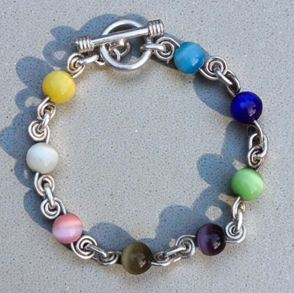 Vintage heavy sterling artisan cats eye bracelet